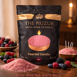 May include: A black bag of "THE HUZUR" pearled candle in wine red with a berry scent. The bag features a candle illustration and the text "BRING HOME THE PEACE!". Berries are scattered around the bag.