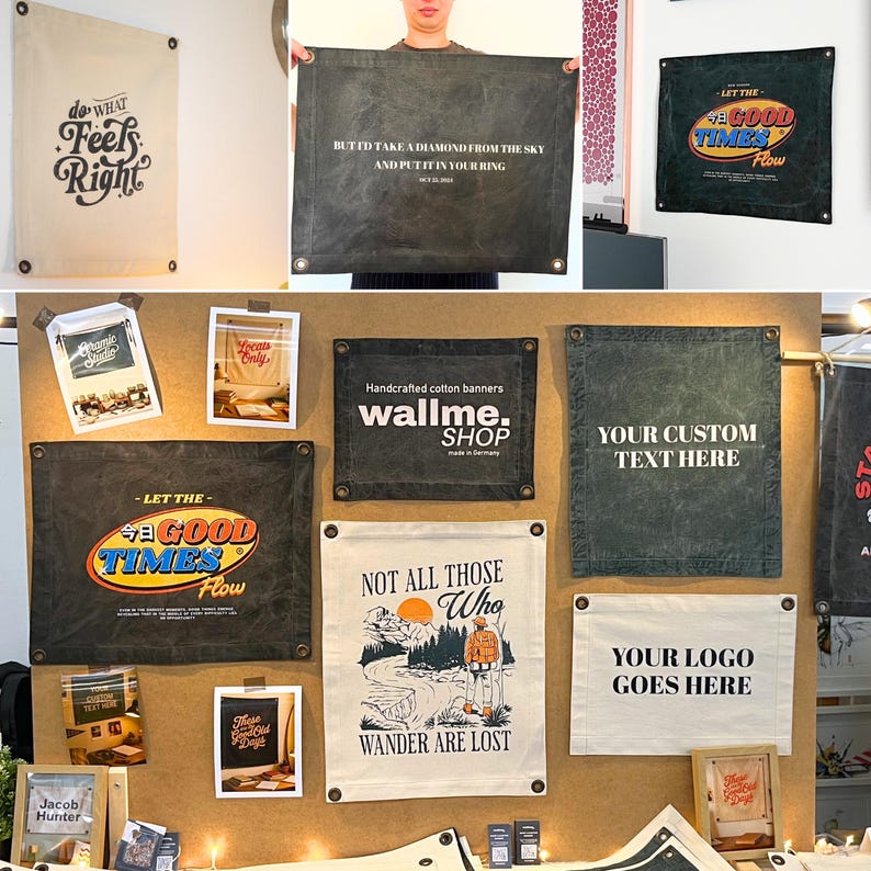 May include: A collection of rectangular fabric wall banners in cream and dark gray, featuring metal grommets at the corners. The banners display various printed graphics and text, including phrases like 'do what feels right' and 'let the good times flow'.