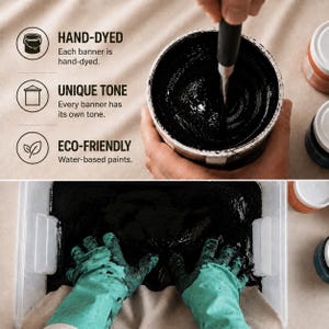May include: A black paint container with a stirring tool and a clear plastic bin filled with black dye. Text reads: HAND-DYED Each banner is hand-dyed. UNIQUE TONE Every banner has its own tone. ECO-FRIENDLY Water-based paints. Green gloves are visible.