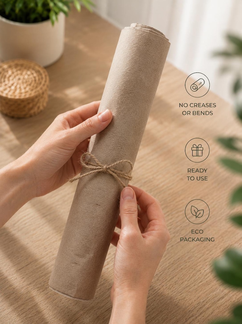 May include: A cylindrical roll of light brown felt fabric tied with a thin jute twine bow. The image includes text icons stating: NO CREASES OR BENDS, READY TO USE, and ECO PACKAGING. The material has a soft, matte, and uniform texture.