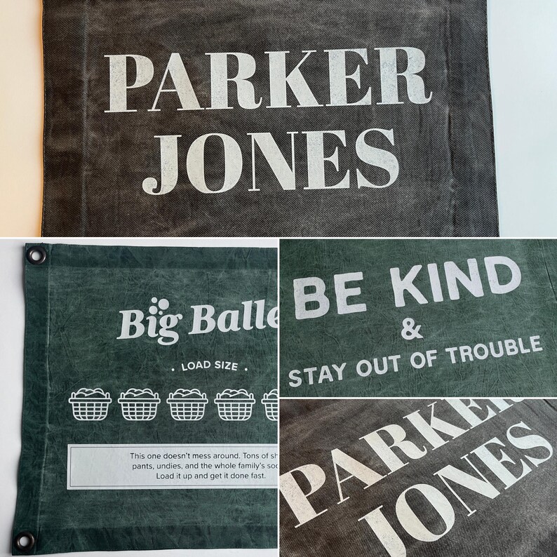 May include: A dark gray and green canvas laundry bag featuring white printed text. The designs include the name PARKER JONES, the phrase BE KIND & STAY OUT OF TROUBLE, and a Big Baller graphic with laundry basket icons and descriptive text.