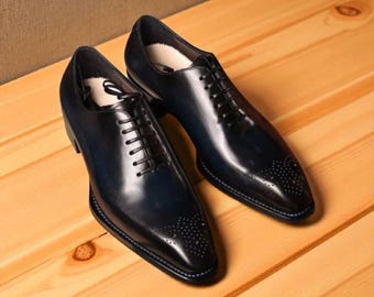 Zapatos Oxford de cuero negro hechos a mano: calzado a medida para bodas, fiestas y ocasiones formales.