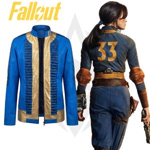 May include: A blue and gold jacket featuring the text Fallout and the number 33. The jacket has a stand-up collar, vertical pleated panels on the front, and a zipper closure. The back view shows a matching blue jumpsuit with the number 33.