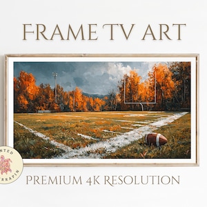 Puede incluir: Obra de arte enmarcada que representa un campo de fútbol americano en otoño. El campo está pintado con colores vibrantes, con un balón de fútbol, líneas blancas y postes de portería. El texto dice "FRAME TV ART" y "PREMIUM 4K RESOLUTION".