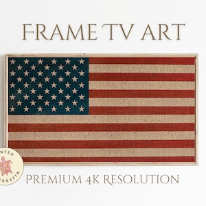 May include: Framed artwork featuring the American flag. The flag design has a vintage, textured appearance with red and beige stripes and a blue field with white stars. The words "FRAME TV ART" are above the artwork.