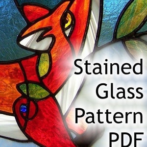 May include: Stained glass pattern PDF for a fox with red, orange, blue and green glass pieces. The fox is facing the right side of the image.
