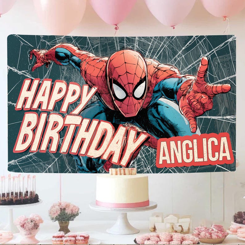 Puede incluir: Un banner de cumplea&ntilde;os con Spider-Man y el texto "HAPPY BIRTHDAY ANGLICA" sobre un fondo de telara&ntilde;a. La escena incluye una tarta de cumplea&ntilde;os y otros postres, con globos rosas en el fondo.