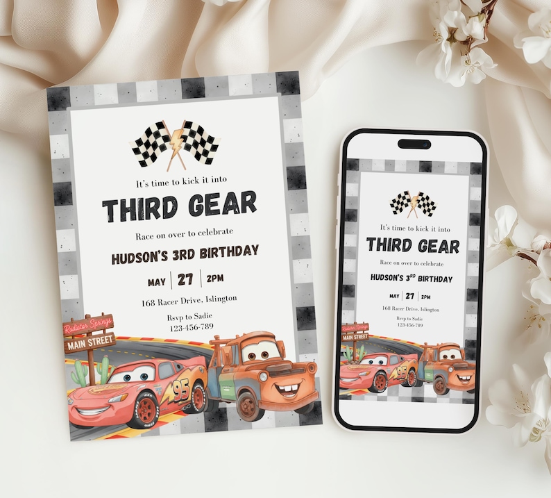 May include: A birthday invitation card and a smartphone displaying the same design. The invitation features a checkered border, two racing flags, and the text "It's time to kick it into THIRD GEAR" with illustrations of two cartoon race cars.