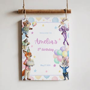 May include: A birthday party sign featuring characters from a popular animated film. The sign says "Welcome to Amelia's 5th birthday" with a date. The design includes balloons, stars, and cartoon characters in pastel colors.
