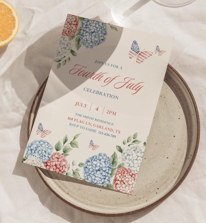 May include: A Fourth of July celebration invitation card with floral and butterfly accents. The card features red, white, and blue hydrangeas and butterflies with an American flag design. The text reads "Join us for a Fourth of July Celebration."