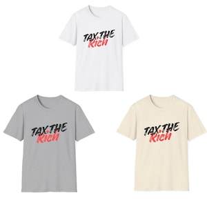 May include: Three short-sleeved crew neck t-shirts in white, heather gray, and cream. Each shirt features the text TAX THE RICH printed on the chest, with TAX THE in black brush-stroke lettering and the word RICH in bold red script.