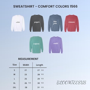 K&ouml;nnte beinhalten: Pr&auml;sentation von sechs Sweatshirts mit Rundhalsausschnitt in verschiedenen Farben: Wei&szlig;, Pfeffer, Blue Jean, Karmesinrot, Seegr&uuml;n und Violett. Das Bild enth&auml;lt eine Gr&ouml;&szlig;entabelle mit Ma&szlig;en in Zentimetern. Der Text "SWEATSHIRT - COMFORT COLORS 1566" steht oben.