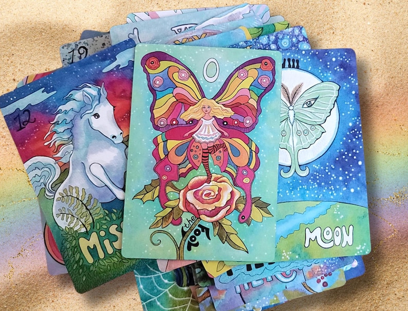 Butterfly fairies on the fool card. Luna moth on the moon card.