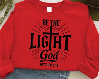 Diseño de camiseta con versículo bíblico cristiano "Sé la luz" (descarga digital)