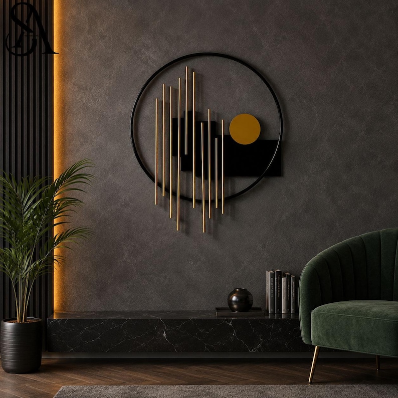 May include: A circular wall art piece featuring a black metal frame, vertical gold-toned rods of varying lengths, a solid black rectangular panel, and a single gold-toned circular disc positioned on the right side of the composition.