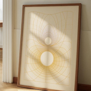 May include: A framed abstract art print featuring a geometric design with concentric circles and curved lines in shades of yellow and white. The artwork is displayed in a wooden frame, leaning against a wall.