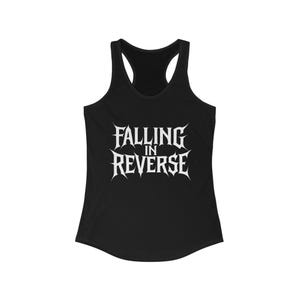 May include: Black racerback tank top with the text "FALLING IN REVERSE" in white, stylized, gothic lettering. The tank top has a scoop neck and a racerback design.