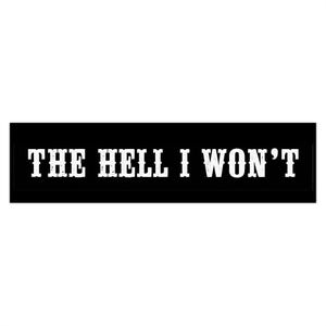 May include: A rectangular black sticker featuring the white text THE HELL I WON'T in a bold, distressed serif font. The lettering is centered horizontally and vertically against the solid black background, creating a high-contrast graphic design.