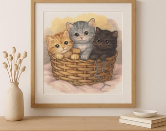 May include: A framed print featuring three adorable kittens in a woven basket. The kittens are a mix of orange, gray, and black, with large, expressive eyes. The artwork is set against a soft, pastel background, creating a charming and heartwarming scene.
