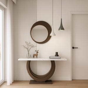 Può includere: Un ingresso moderno con una consolle marrone e bianca, uno specchio rotondo e due lampade a sospensione. Il tavolo ha un piano in marmo e un'esclusiva base curva. Sono presenti anche un tappeto decorativo e una piccola statuina di cervo.
