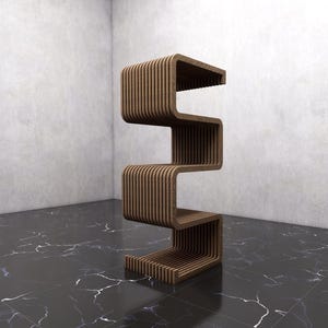 May include: A modern, brown wooden shelf unit with a unique, zig-zag design. The unit has multiple open shelves, perfect for displaying items. The wood grain is visible, adding warmth to the contemporary design. The unit stands on a dark, marble-like floor.
