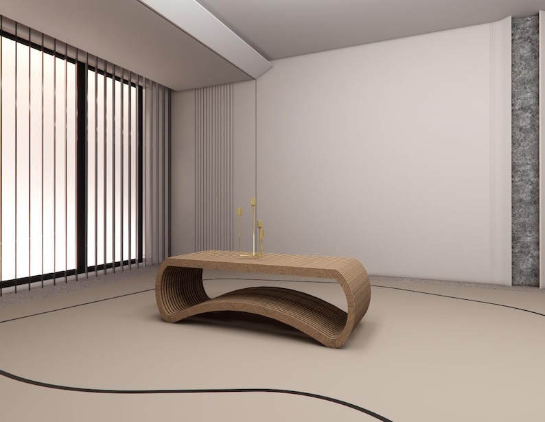 May include: A modern, wooden coffee table with a unique, curved design. The table is light brown and has a lower shelf. The room features large windows with vertical blinds, a neutral color palette, and decorative accents.