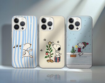 May include: Three phone cases featuring Snoopy from Peanuts. One case has blue and white vertical stripes with Snoopy running. Another has Snoopy decorating a Christmas tree. The third case shows Snoopy ice skating and decorating a Christmas tree.