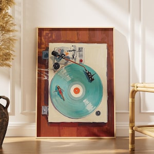 Puede incluir: Una impresión artística enmarcada de un tocadiscos vintage. La obra presenta un disco de vinilo turquesa con un centro rojo, una mujer en traje de baño rojo y un brazo fonocaptor negro. El fondo es una mezcla de tonos blancos y marrones.