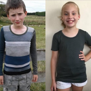May include: Two children wearing long-sleeved shirts. The boy is wearing a gray and blue striped shirt with long sleeves. The girl is wearing a dark green shirt with short sleeves.