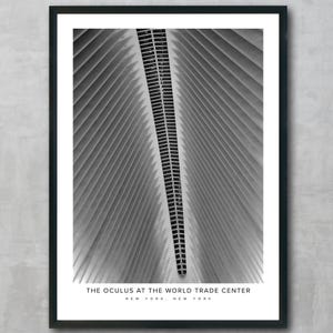 May include: Black and white photograph of the Oculus at the World Trade Center in New York City. The image shows the interior of the building, with its distinctive geometric design of angled, intersecting lines.
