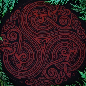 May include: A red and black intricate design with a Celtic knot pattern. The design is on a black background and features a repeating pattern of swirls and knots.