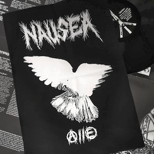 May include: A black and white vinyl record sleeve featuring the band name NAUSEA in a jagged, stylized font at the top. Below the text is a large white graphic of a bird in flight, with an anarchy symbol and the text A.I.E. at the bottom.