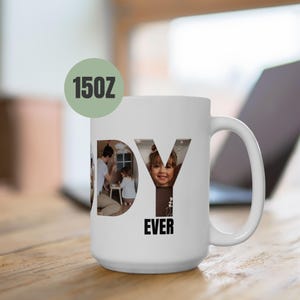 May include: White ceramic mug with a photo collage of a family inside the letters "DADDY" and the text "EVER" below. The mug is 15 oz.