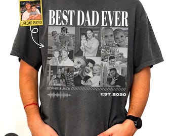 May include: Dark gray t-shirt with the text "BEST DAD EVER" in white block letters. The shirt features a collage of black and white photos and the text "SOPHIE & JACK EST. 2020". A small photo with the text "UPLOAD PHOTO" is on the upper left.