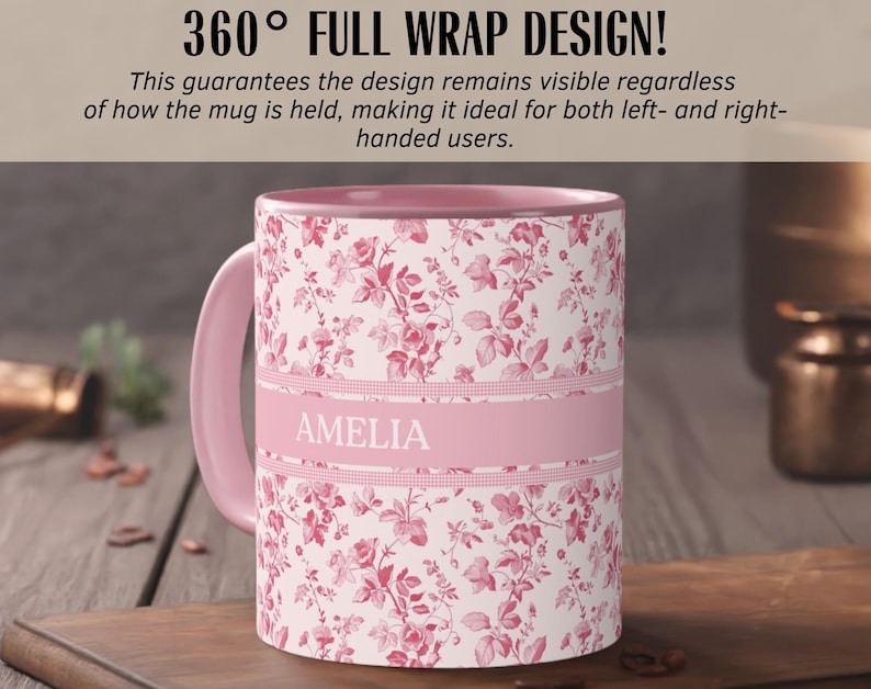 May include: A pink floral mug with the name "AMELIA" in white letters. The mug has a pink handle and interior. The design features a repeating pattern of red flowers on a white background. The text "360&deg; FULL WRAP DESIGN!" is at the top.