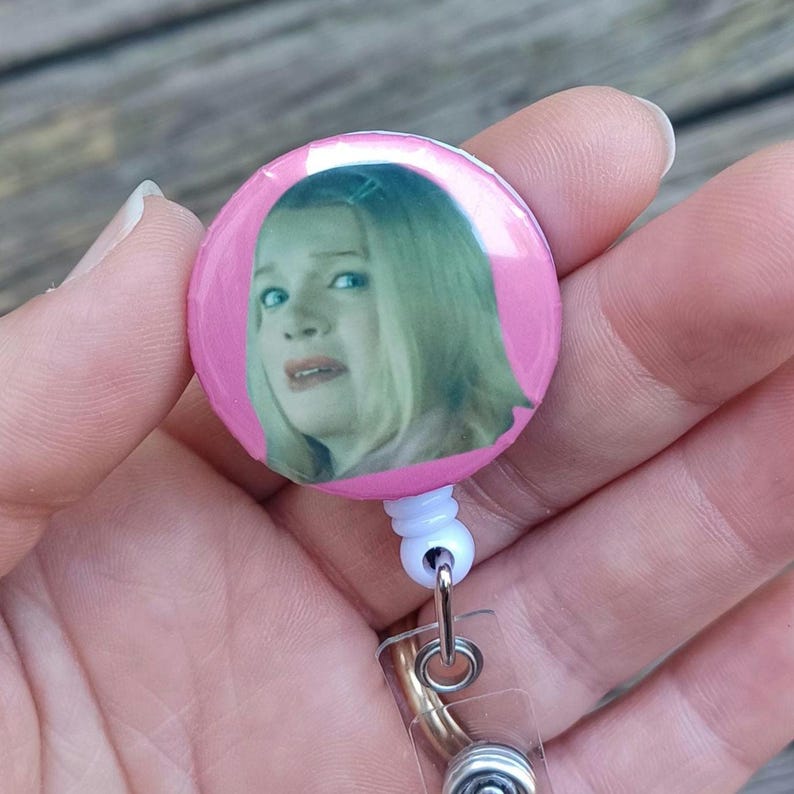 side eye button comes with either a belt clip or alligator clip.