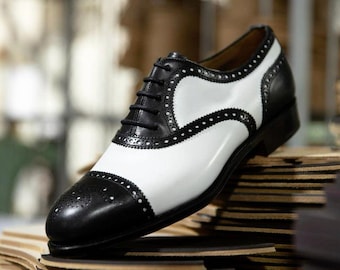 Zapatos Oxford Brogue de piel hechos a mano, con puntera de ala y construcción Goodyear Welt.