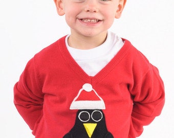 Pablo Penguin Kids Christmas Sweater with removable Santa hat