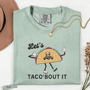 Comfort Colors® Lets Taco Bout It  T-Shirt, Fun Taco Graphic Tee, Casual Foodie Shirt, Funny Anti Trump Taco Shirt, Funny Trump Taco Shirt