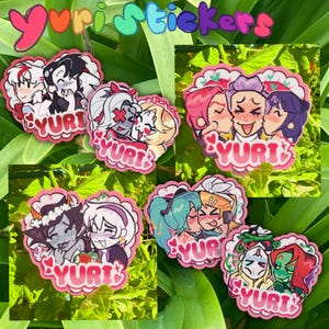 May include: A collection of six die-cut stickers featuring anime-style characters in romantic poses with the text YURI printed on each. The stickers display various character pairings with colourful hair, blushing expressions, and heart accents on a green background.
