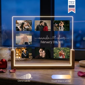 May include: A wooden-based LED photo display with six pictures, the names "amanda oliver" and the date "February 11th, 2011". The display has a dimmable feature and cool-warm white light options. The words "MADE IN USA" are also visible.