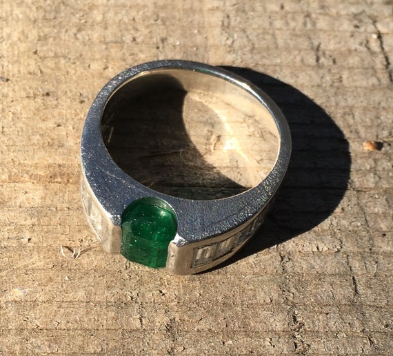 1 Ct. Emerald in Platinum cocktail ring with 1 Ct.