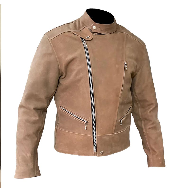 May include: A brown leather jacket with a zipper closure and multiple pockets. The jacket has a stand-up collar and a slightly asymmetrical zipper.