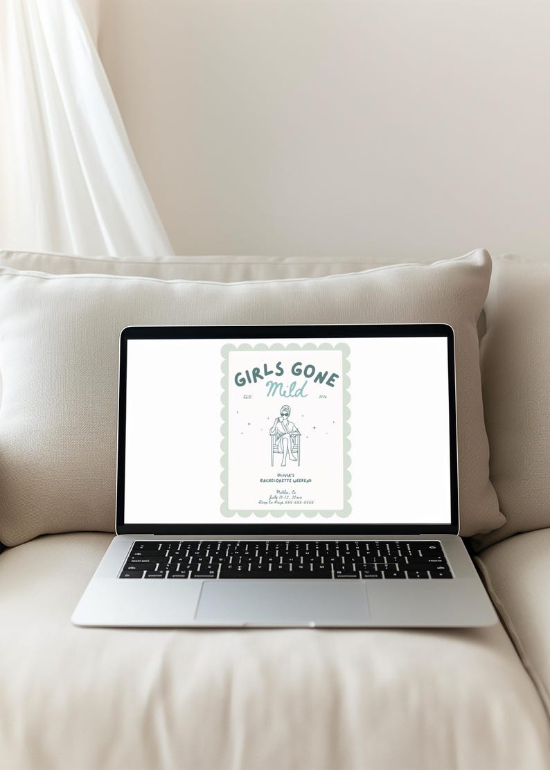 May include: A laptop displaying a light green and white graphic with the text "Girls Gone Mild." The graphic includes an illustration of a person sitting in a chair. The laptop is on a beige couch.