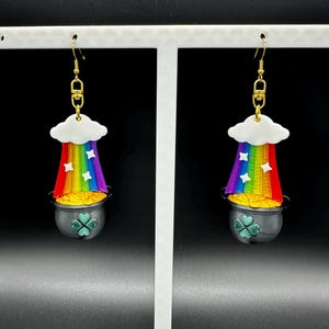 May include: A white ceramic mug with a black handle and the text "But First, Coffee" in a black, bold font. The mug is on a white surface.