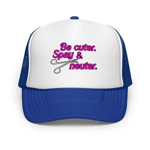 May include: A blue and white trucker hat with the text "Be cuter. Spay & neuter." in pink, along with a graphic of surgical scissors. The hat has a mesh back and a curved brim.