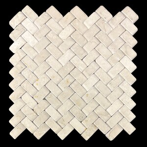 May include: A square mosaic tile pattern in a herringbone design. The tiles are rectangular and a light beige color, arranged in a repeating diagonal pattern. The background is black.