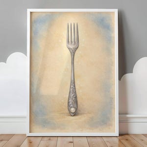 May include: A framed print featuring a detailed illustration of a silver fork. The fork has an ornate handle with a pearl-like detail at the base. The background has a soft, watercolor-like effect with beige and blue tones.