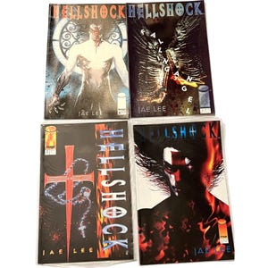 May include: Four comic books titled "Hellshock" by Jae Lee. The covers feature illustrations of a muscular figure, a winged creature, a cross with a rosary, and a demonic face. The comic books are in plastic sleeves.