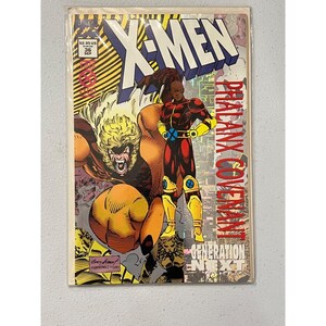 May include: X-Men comic book, issue #36, featuring the Phalanx Covenant storyline. The cover art showcases a fierce, yellow-haired character and a figure in red and black armor. The comic is sealed in a protective plastic sleeve.